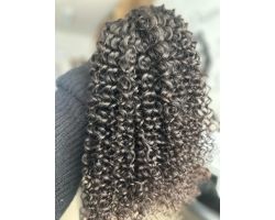 Toupet afro bouclé de couleur vierge